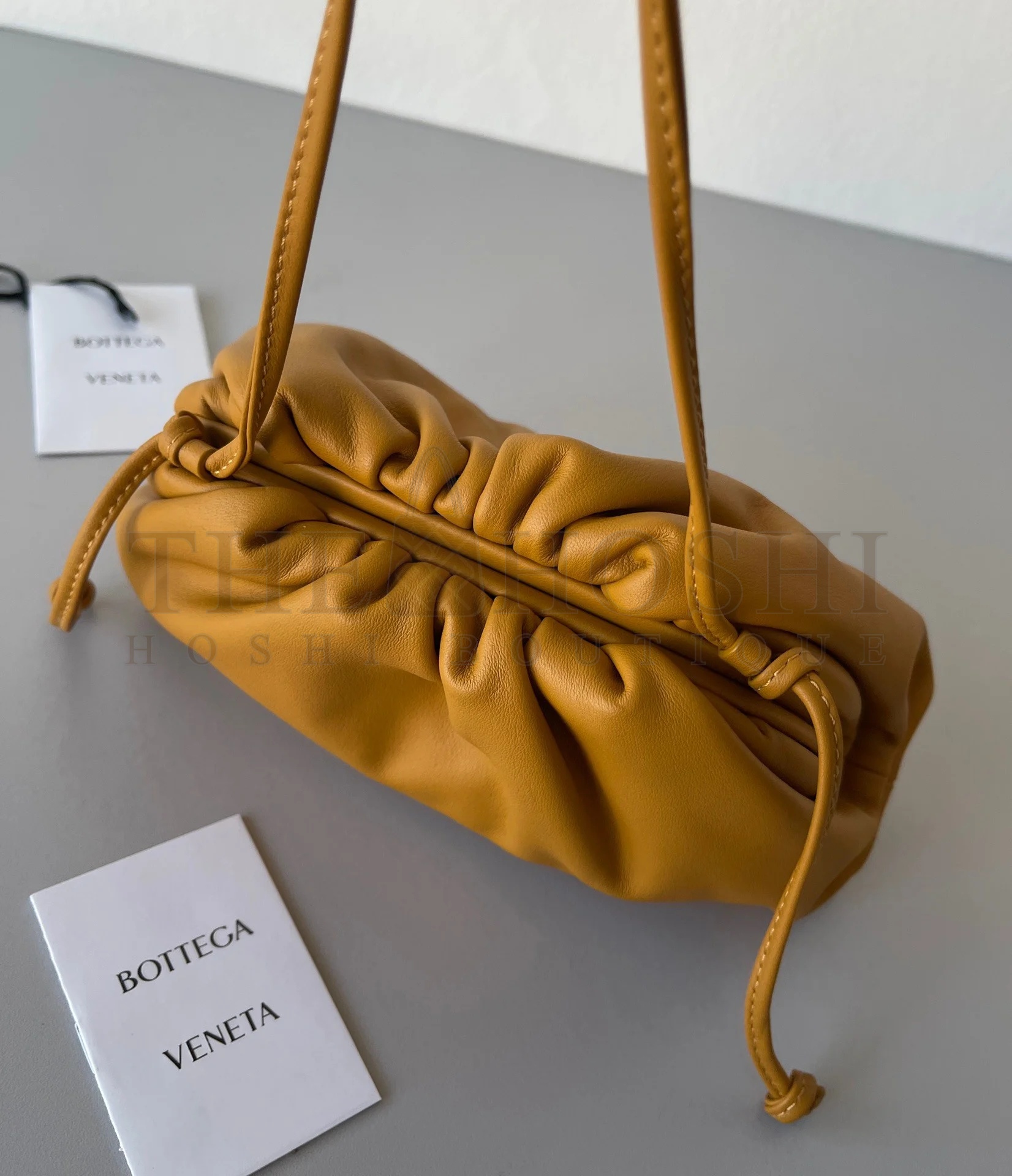 B0tt*ga Ven*ta Mini Pouch with Strap in Teak Calfskin Master Quality